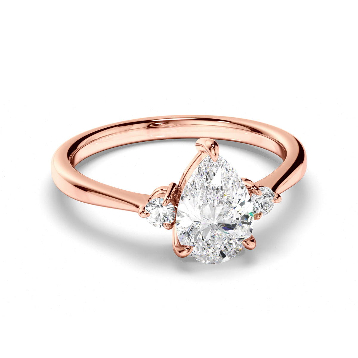 Pear Cut Diamond Trilogy Engagement Ring with Round Brilliant Sides