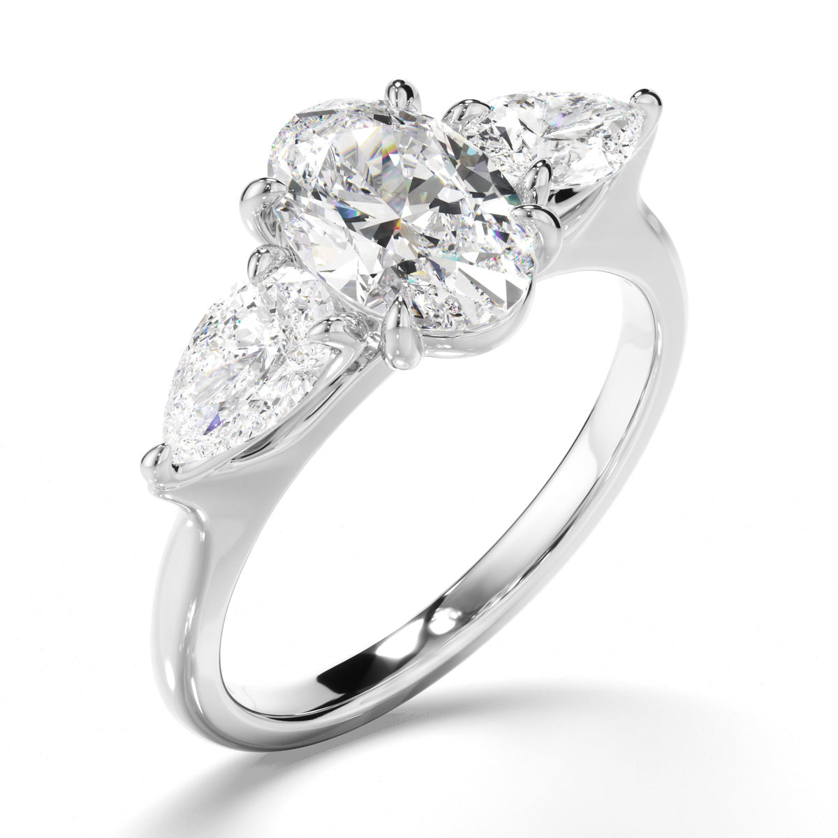 Oval Cut Diamond Trilogy Engagement Ring with Pear Sides